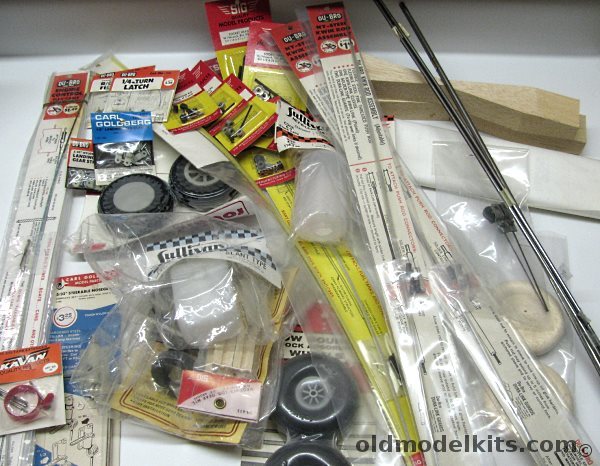 Other Big Box 'O R/C Accessories / Sullivan Fuel Tanks / Du-Bro Hinges and Horns / SIG Nuts and Bolts / Du-Bro Robart Wheels / Prop Blanks / Balsa Wheels / Push Rods / Struts and Strut Stock plastic model kit